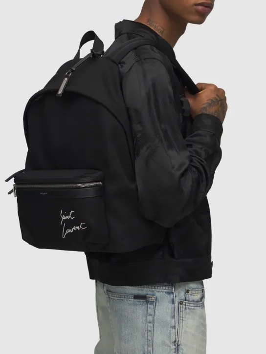 Saint Laurent   Embroidered detail canvas backpack 