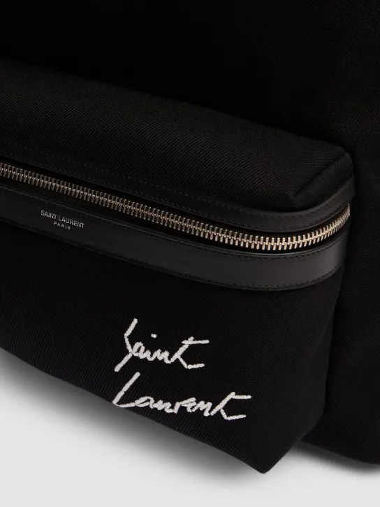 Saint Laurent   Embroidered detail canvas backpack 